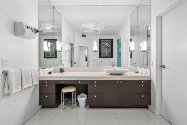 bathroom with tile patterned flooring, ceiling fan, and vanity