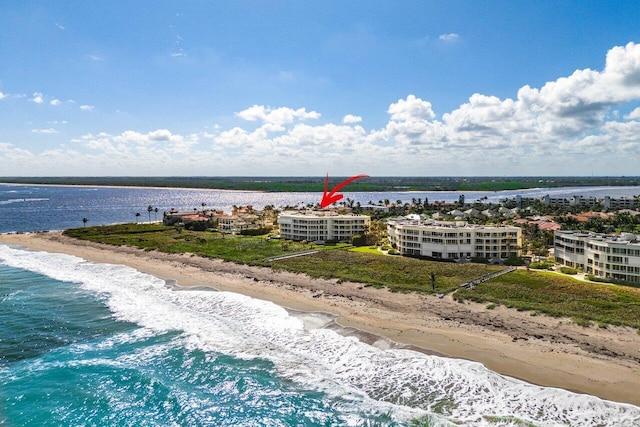 aerial view featuring a water view and a view of the beach