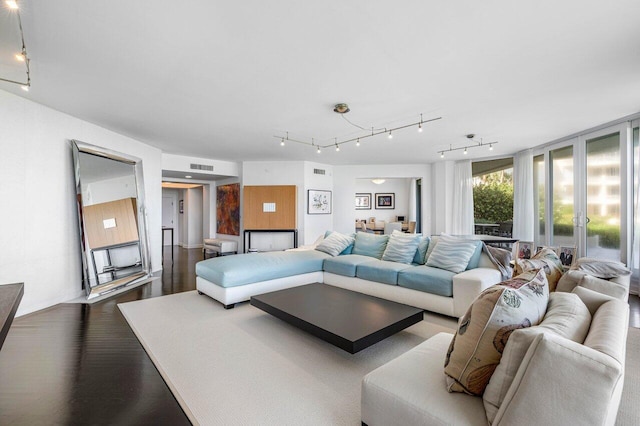 living room with dark wood-type flooring