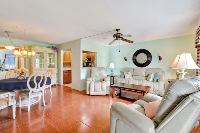 living room with ceiling fan with notable chandelier