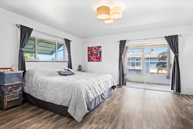 bedroom featuring dark wood-type flooring