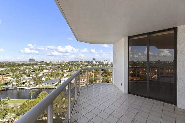 balcony featuring a water view