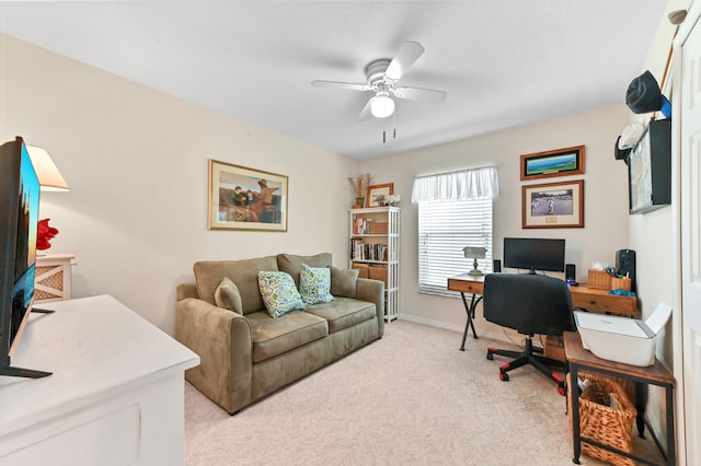 carpeted office with ceiling fan