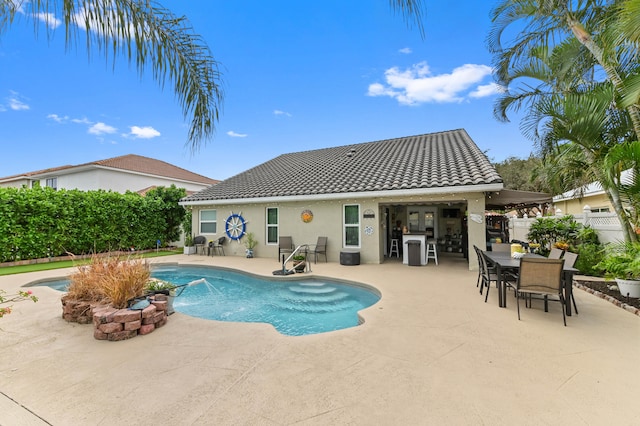 view of swimming pool featuring a patio