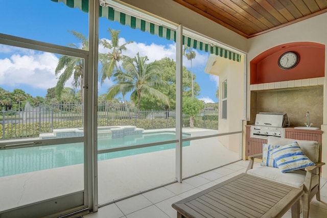 sunroom with wooden ceiling