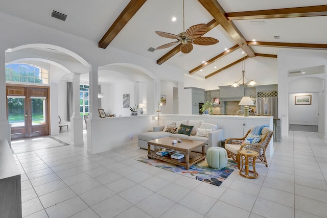 living room featuring light tile patterned floors, high vaulted ceiling, french doors, and beam ceiling