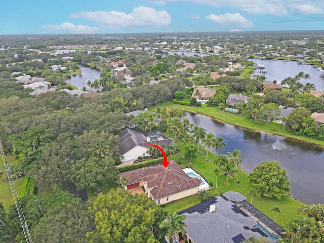 bird's eye view with a water view