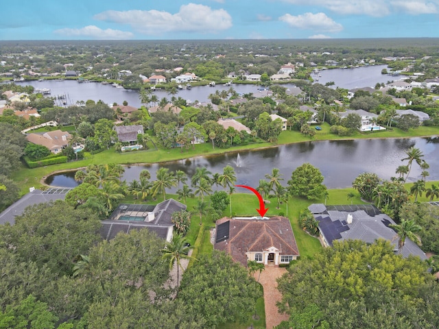 drone / aerial view with a water view