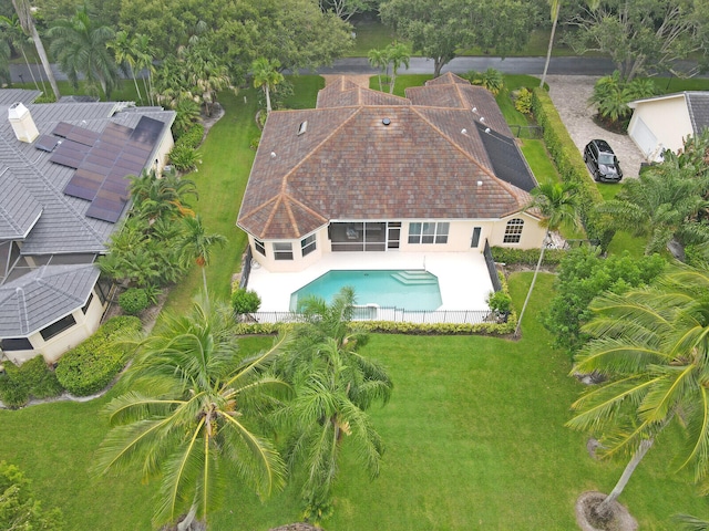 view of pool featuring a sunroom and a patio area