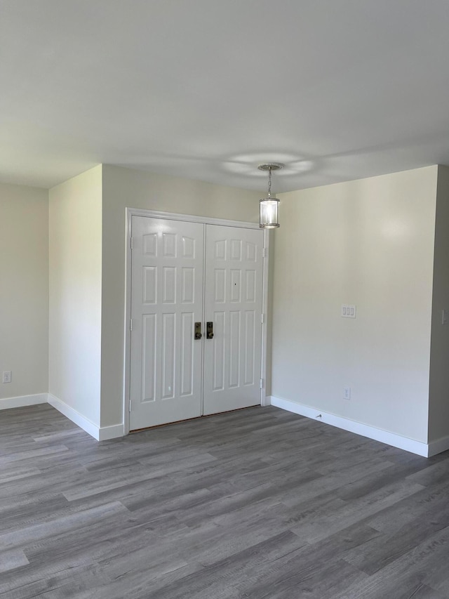 empty room featuring dark hardwood / wood-style floors