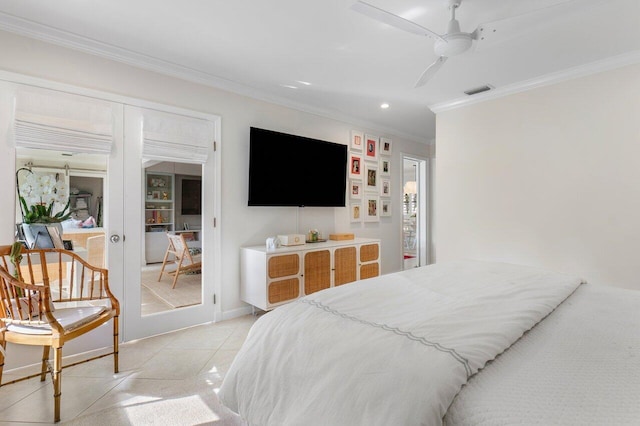 tiled bedroom featuring french doors, ceiling fan, and ornamental molding