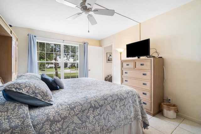 bedroom with light tile patterned floors and ceiling fan