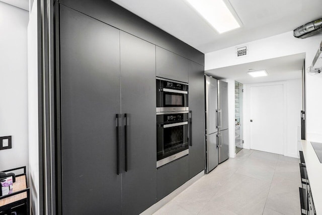 kitchen featuring stainless steel double oven