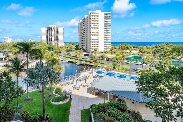 birds eye view of property with a water view