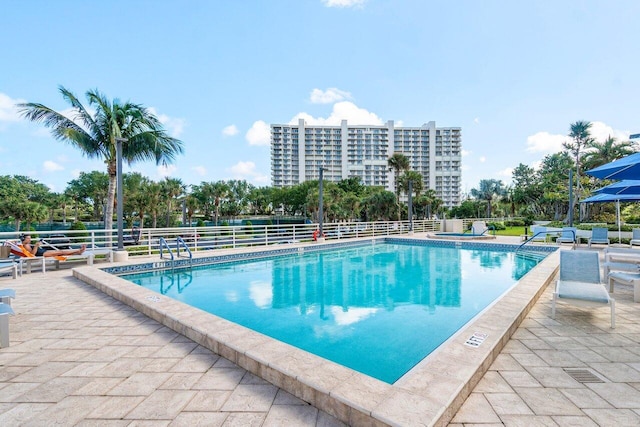 view of swimming pool featuring a patio