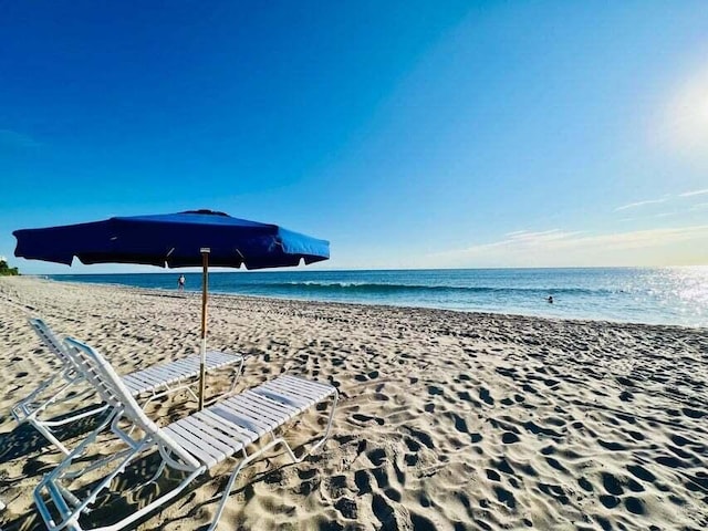 property view of water featuring a view of the beach