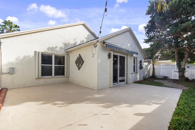 back of house featuring a patio area