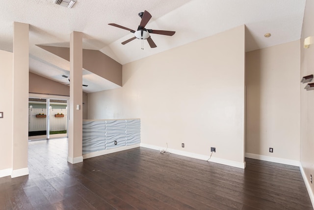 unfurnished room with a textured ceiling, ceiling fan, dark hardwood / wood-style flooring, and vaulted ceiling