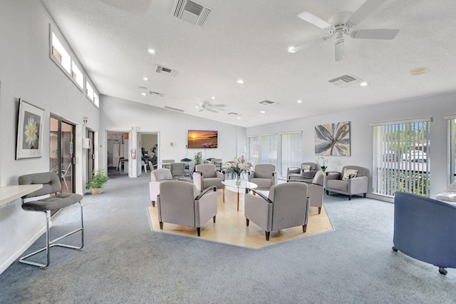 carpeted living room with ceiling fan, lofted ceiling, a textured ceiling, and french doors