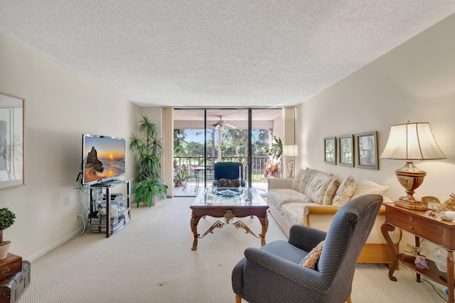 carpeted living room with a textured ceiling