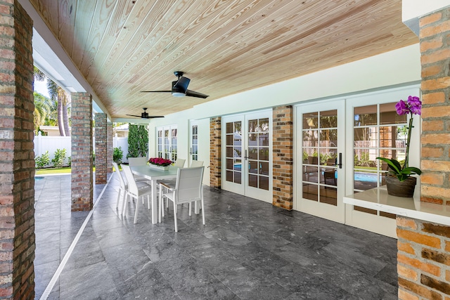 view of patio featuring ceiling fan and french doors