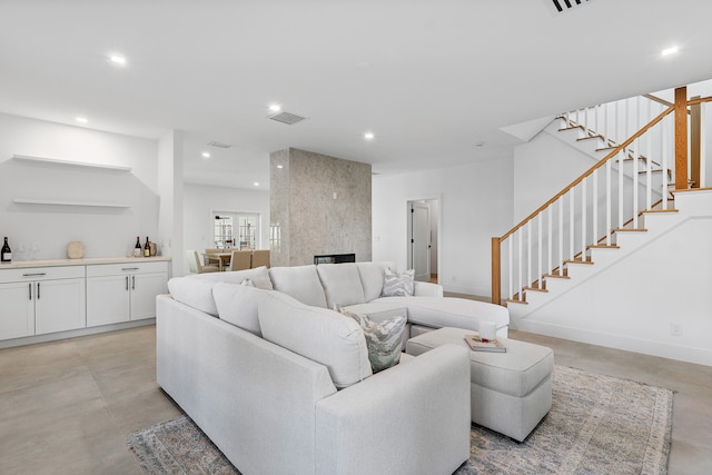 living room featuring a fireplace