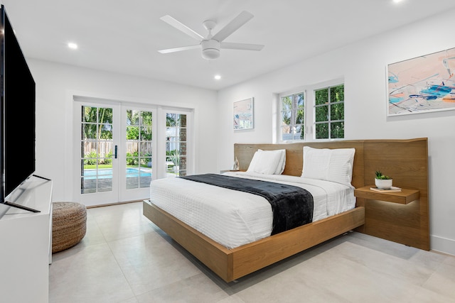 bedroom featuring access to exterior, french doors, multiple windows, and ceiling fan