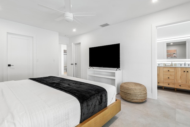 bedroom with ceiling fan and sink