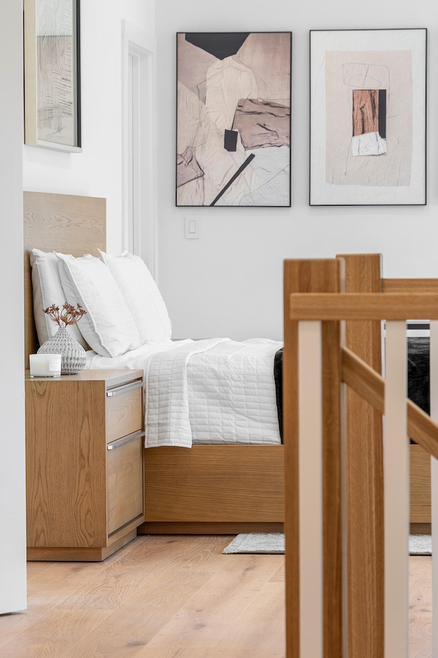 bedroom featuring light hardwood / wood-style floors