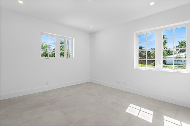 unfurnished room with a healthy amount of sunlight