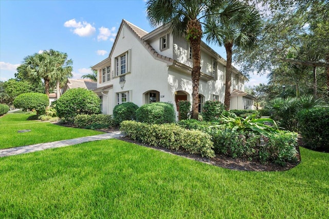 view of front of house with a front lawn