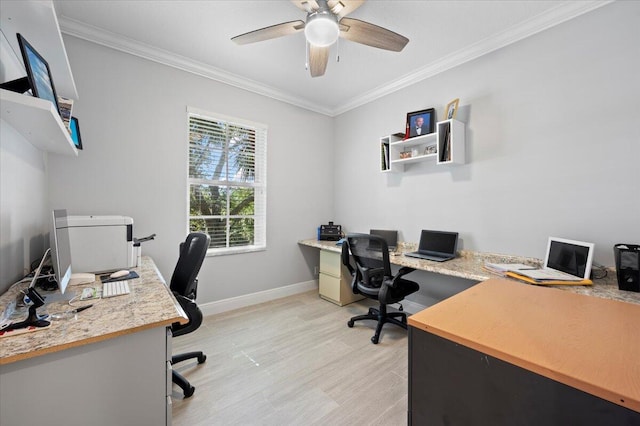 office space with ceiling fan, crown molding, and light wood-type flooring