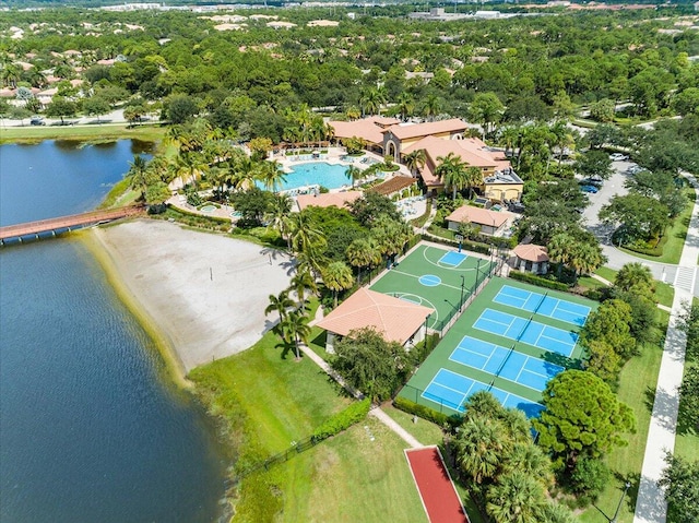 birds eye view of property with a water view