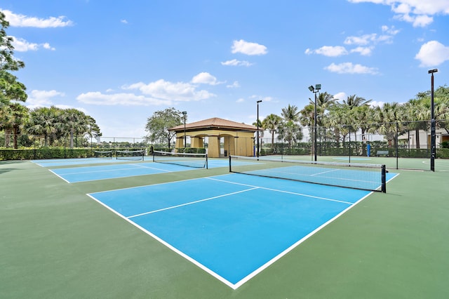 view of tennis court with basketball court