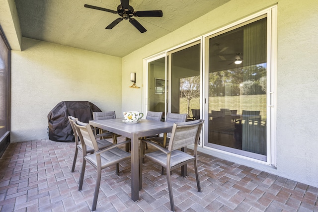 view of patio / terrace featuring ceiling fan and grilling area