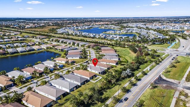 bird's eye view with a water view