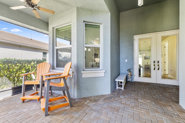 view of patio / terrace with french doors and ceiling fan