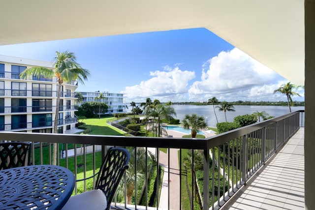 balcony featuring a water view