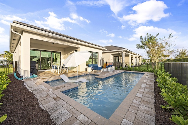 view of pool with a patio area