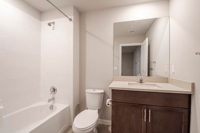 full bathroom with vanity, toilet, and tiled shower / bath