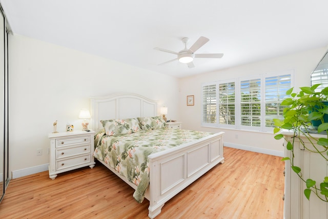 bedroom featuring light hardwood / wood-style flooring and ceiling fan