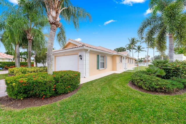 view of property exterior with a yard and a garage