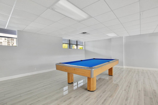 recreation room with a healthy amount of sunlight, light hardwood / wood-style floors, and billiards