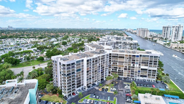 birds eye view of property featuring a water view