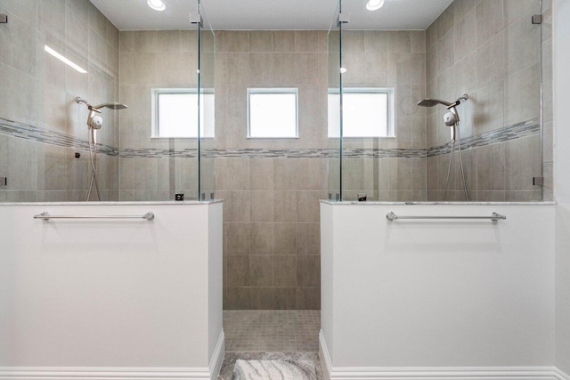 bathroom with a tile shower