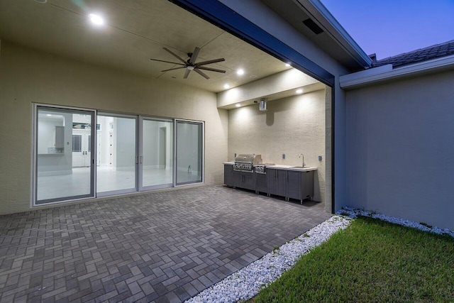 view of patio / terrace featuring grilling area and ceiling fan