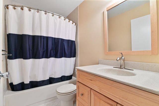 full bathroom with tile patterned floors, shower / bathtub combination with curtain, vanity, and toilet