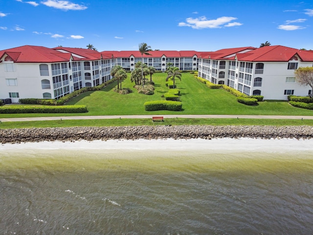 exterior space with a water view