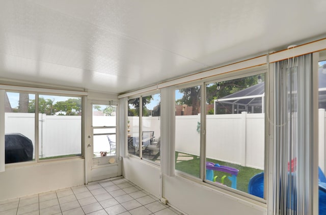 view of unfurnished sunroom