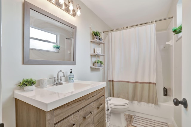 full bathroom with toilet, vanity, and shower / bathtub combination with curtain